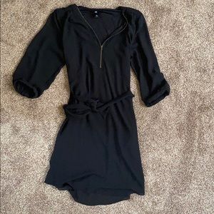 Silky black dress with zipper and belt